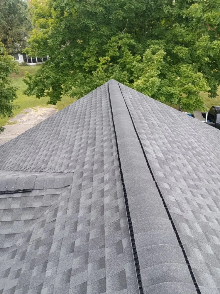 Slide of Caceres Roofing