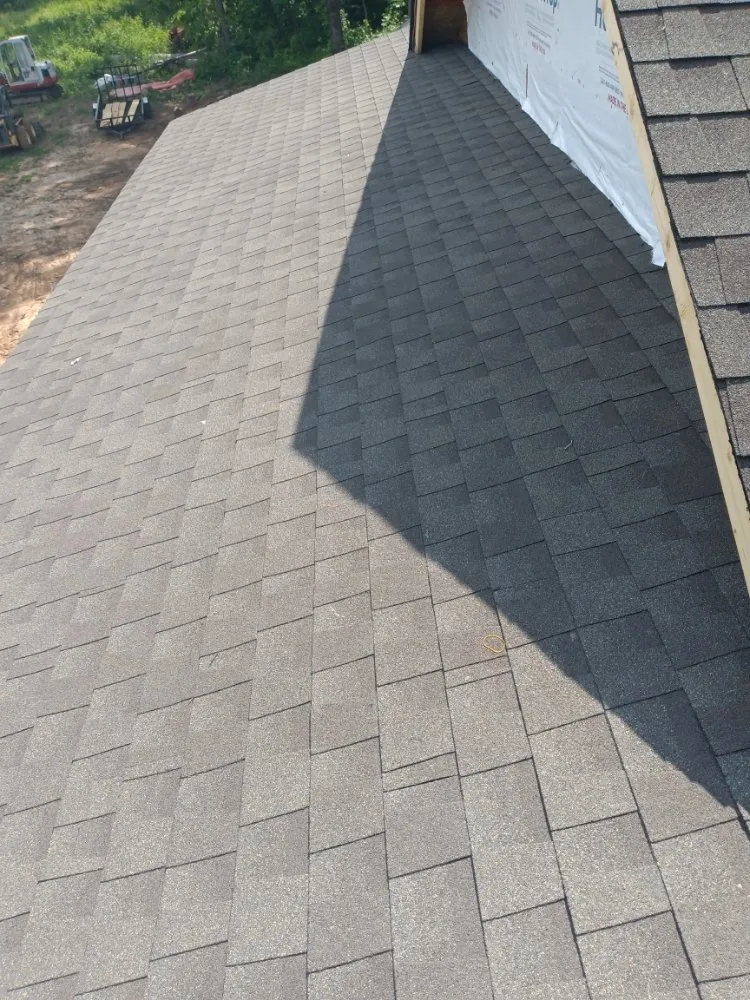 Slide of Caceres Roofing