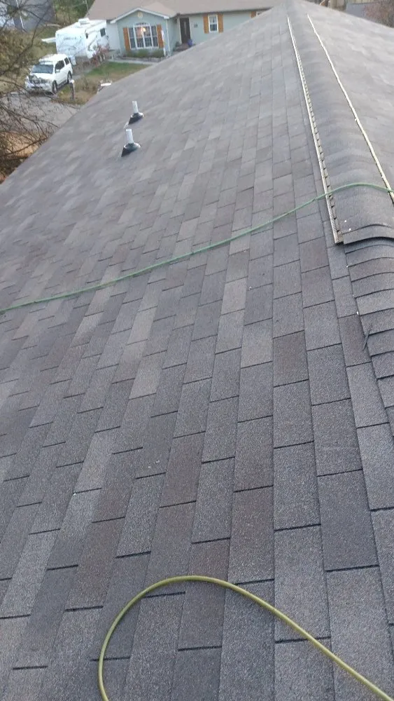 Slide of Caceres Roofing