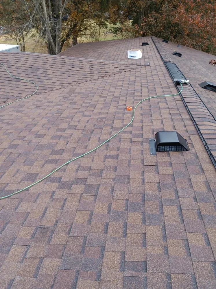 Slide of Caceres Roofing