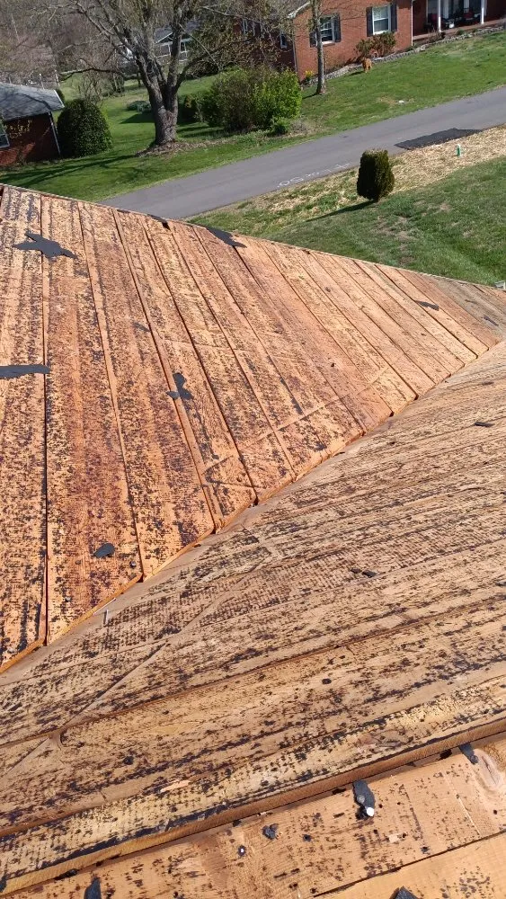 Slide of Caceres Roofing