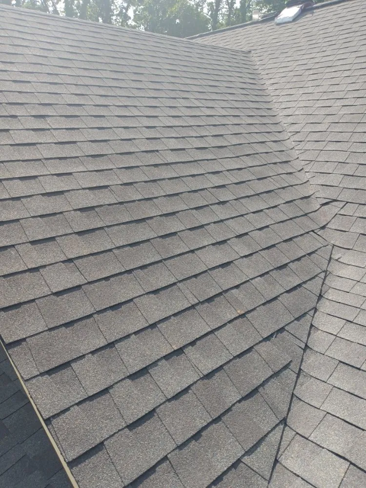 Slide of Caceres Roofing