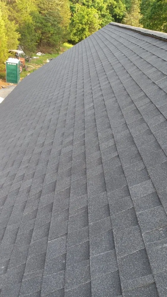 Slide of Caceres Roofing