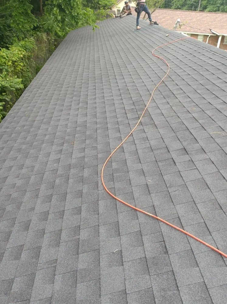 Slide of Caceres Roofing