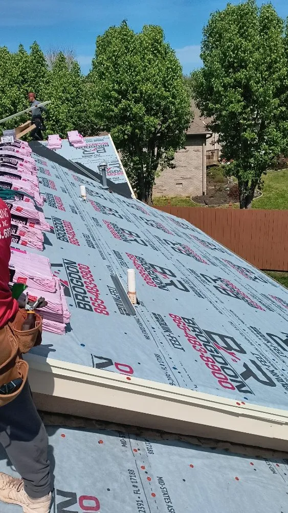 Slide of Caceres Roofing