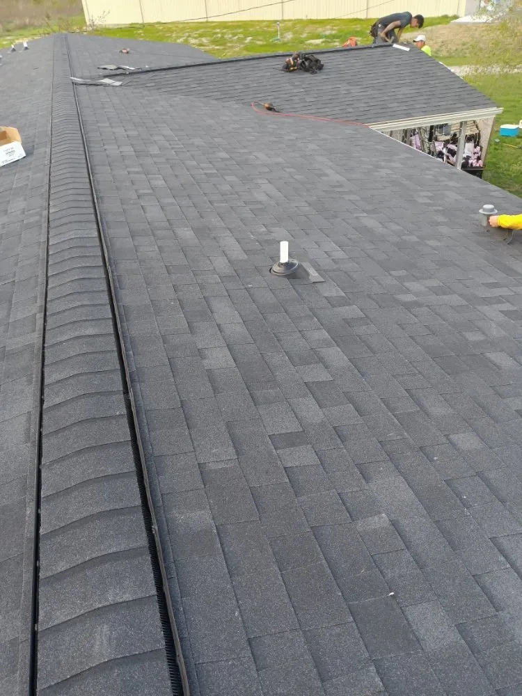 Slide of Caceres Roofing