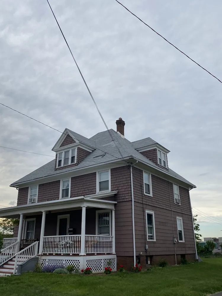 Slide of Cachis Roofing