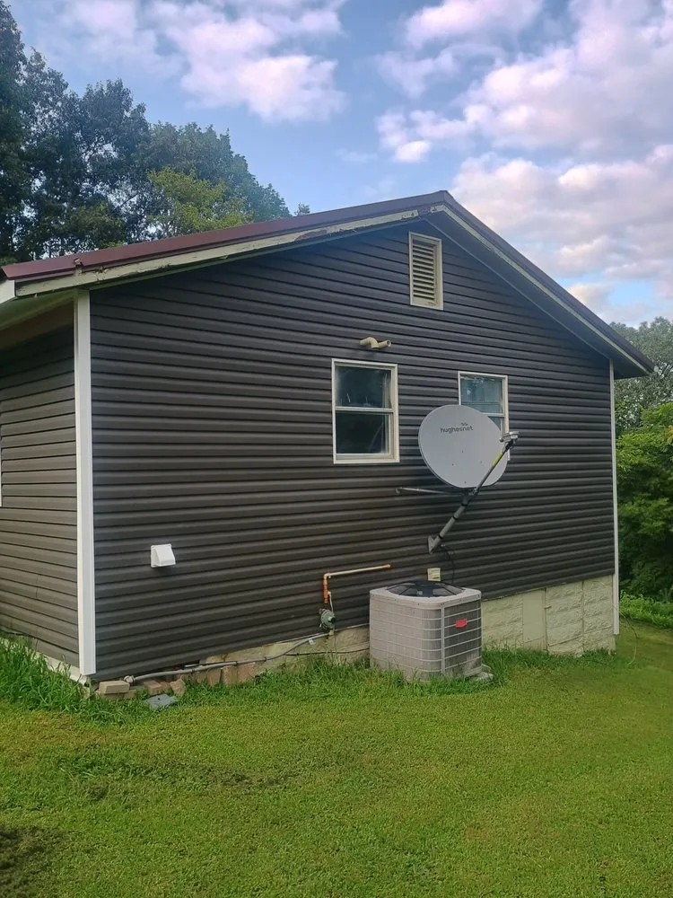 Top-rated roof leak repair for homes in Davisville, WV by Cain's Construction And Restoration