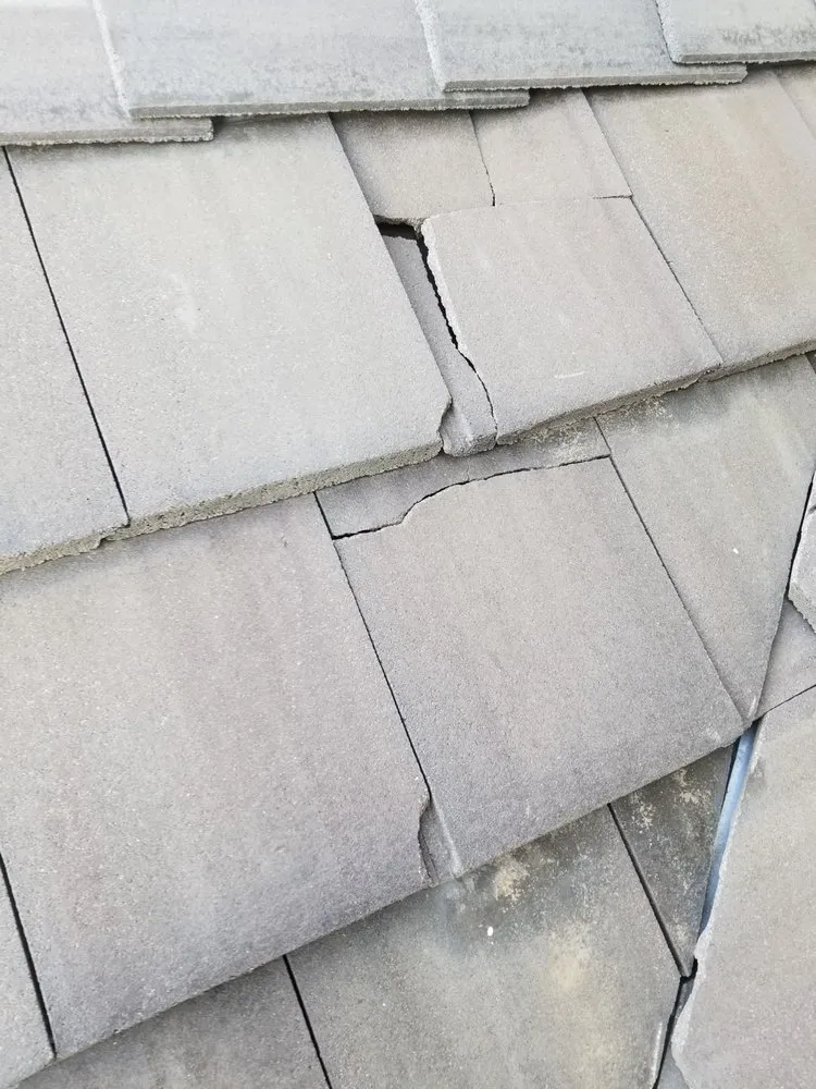 Slide of Cairn Roofing Group