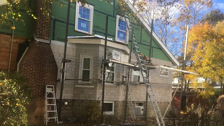 Slide of Caizan Roofing