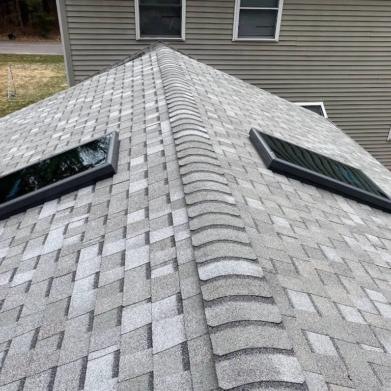 Slide of Caizan Roofing