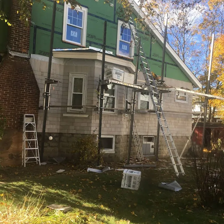 Slide of Caizan Roofing