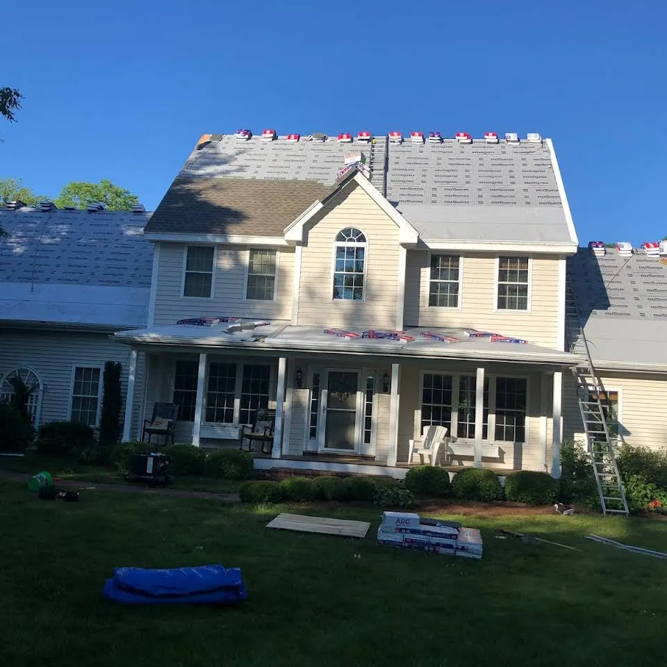 Slide of Caizan Roofing