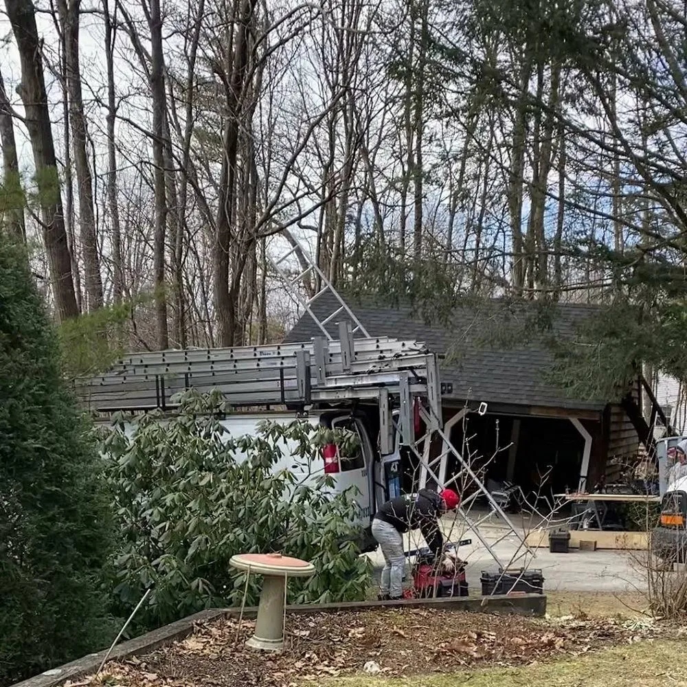 Slide of Caizan Roofing