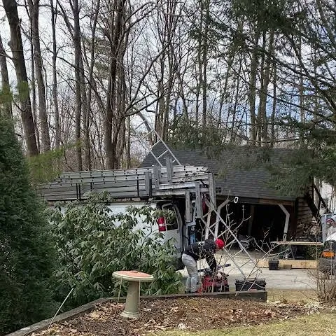 Slide of Caizan Roofing