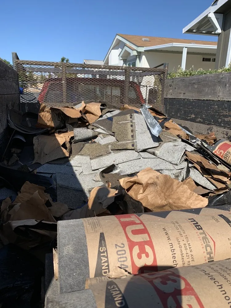 Slide of CalBurrey Roofing Construction