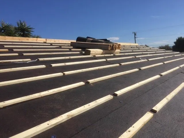 Slide of Calcom Roofing