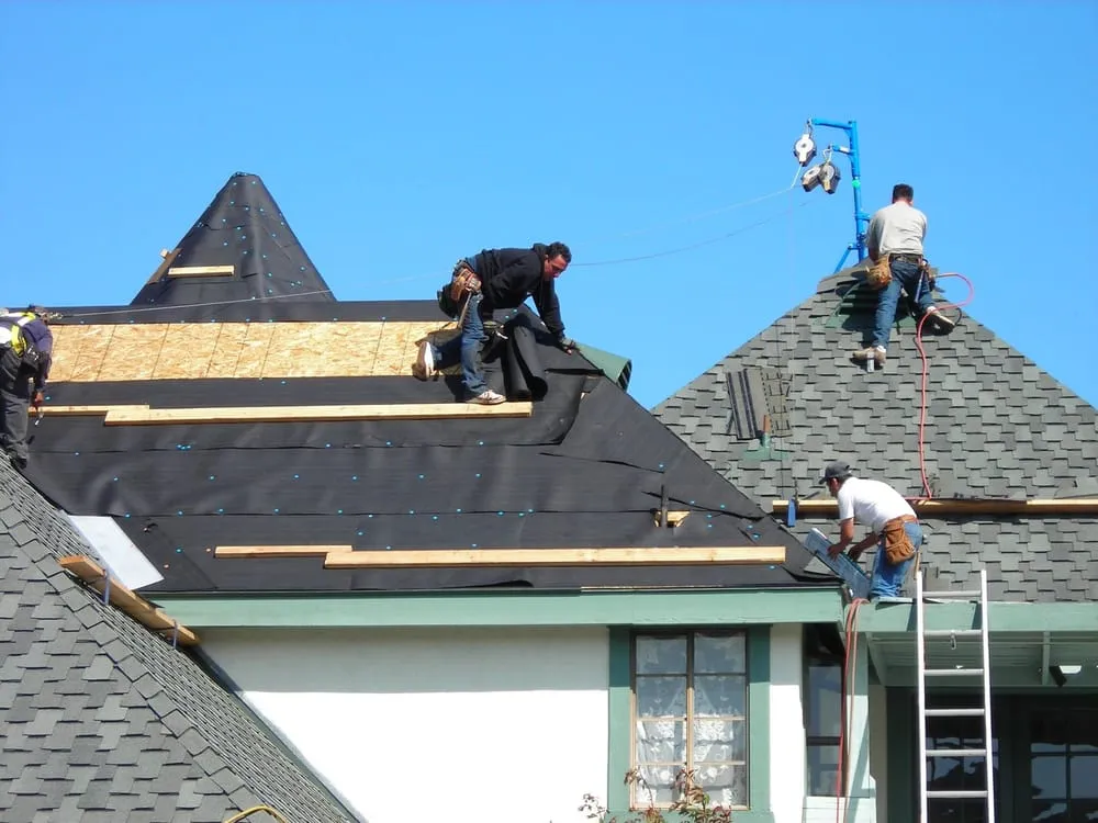 Slide of Calcom Roofing