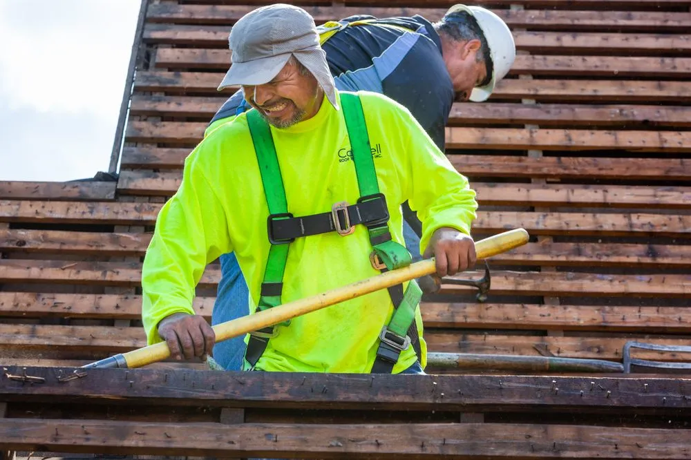 Slide of Caldwell Roof Restoration