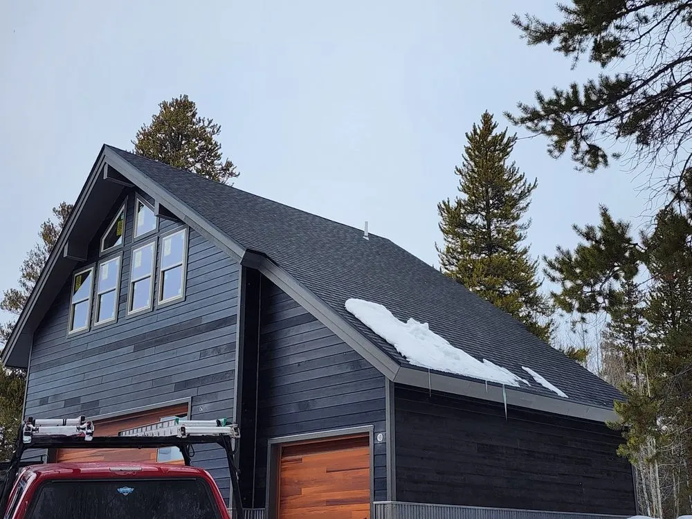 Slide of Calels Roofing