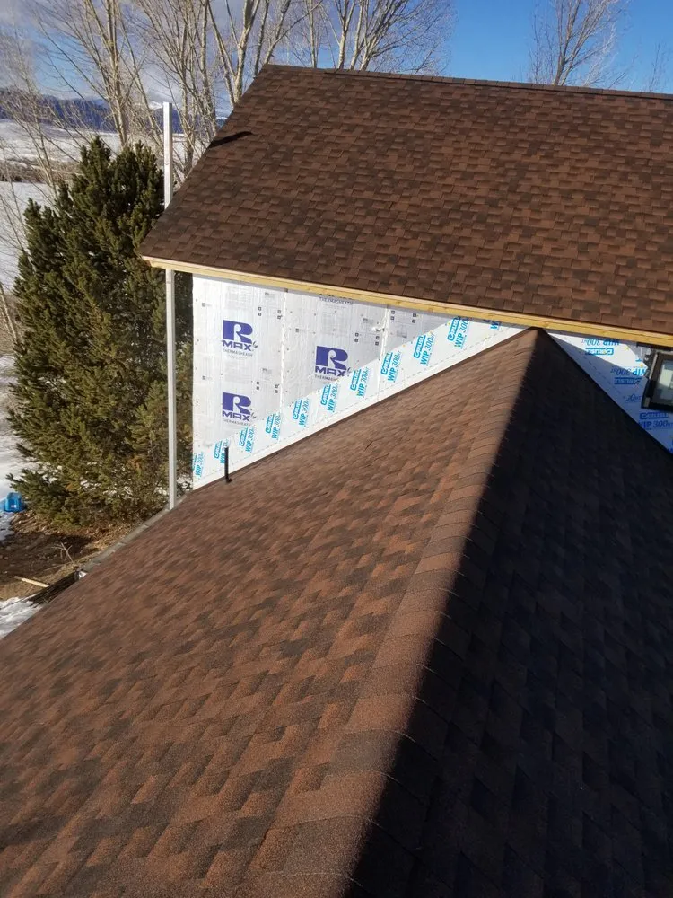 Slide of Calels Roofing