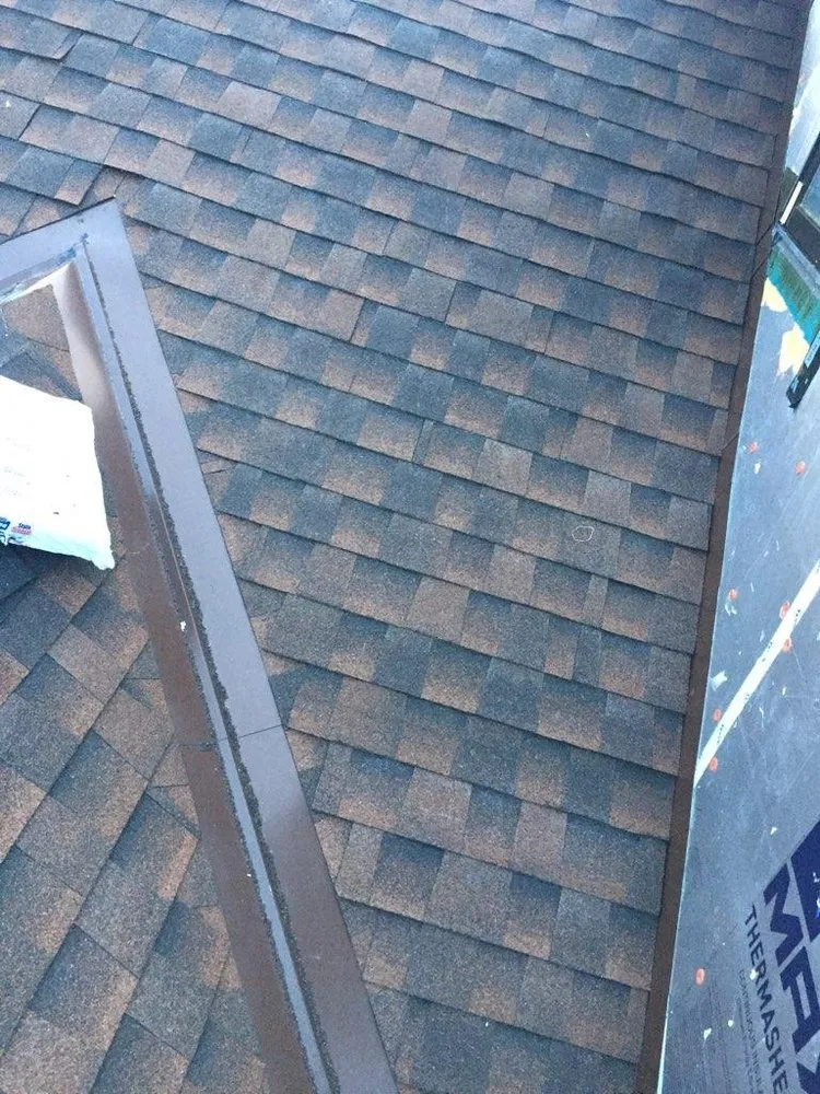 Slide of Calels Roofing