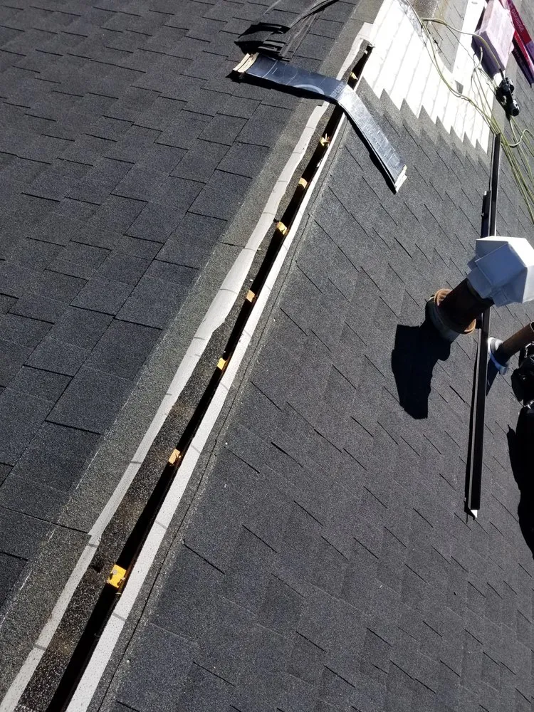 Slide of Calels Roofing