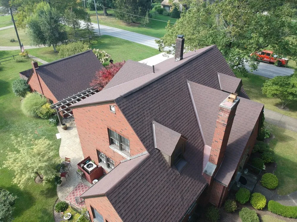 Slide of Caliber Metal Roof & Shingles