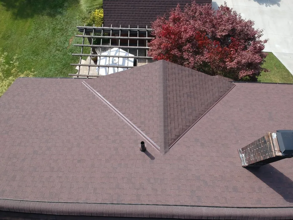 Slide of Caliber Metal Roof & Shingles
