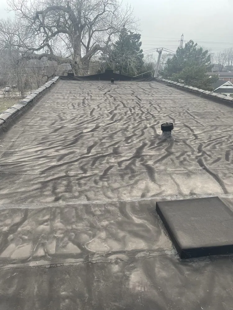 Slide of Caliber Roofing & Construction