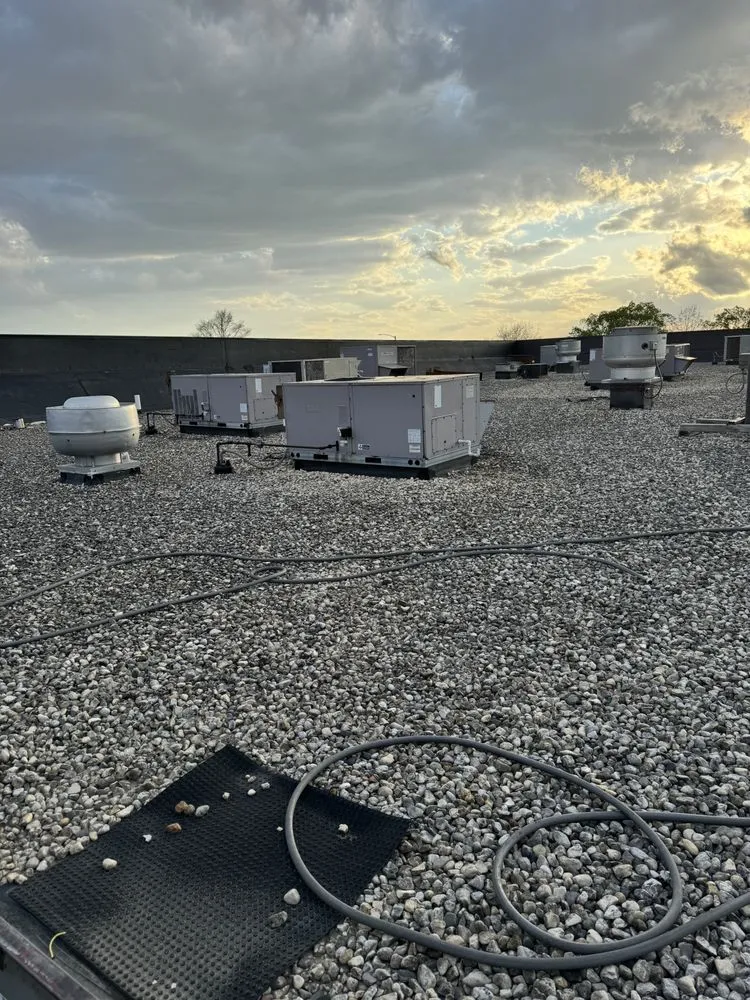 Slide of Caliber Roofing & Construction