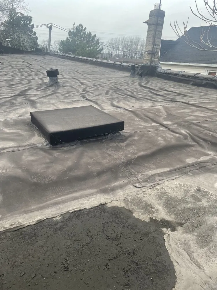 Slide of Caliber Roofing & Construction