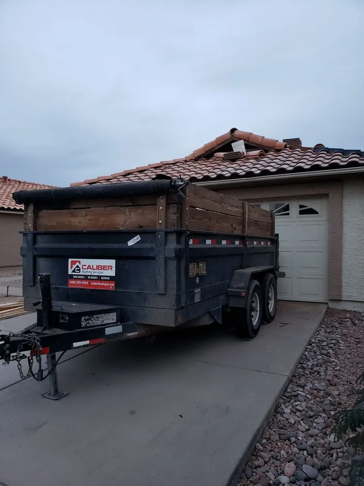 Slide of Caliber Roofing And Solar Services