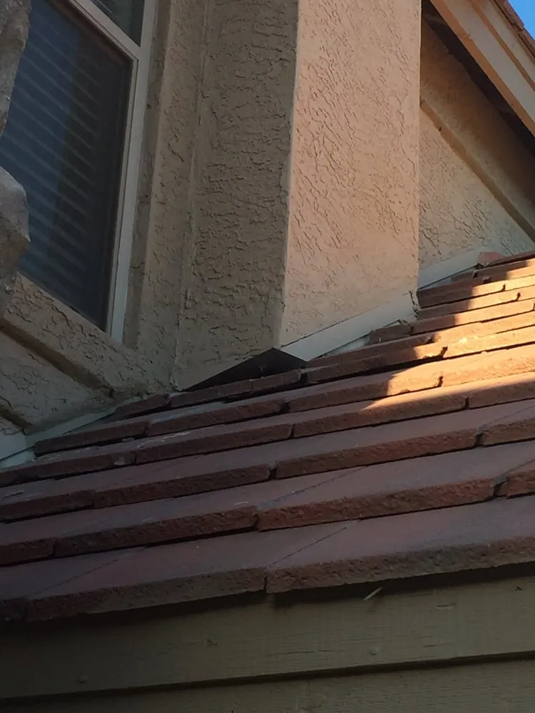 Slide of Caliber Roofing And Solar Services