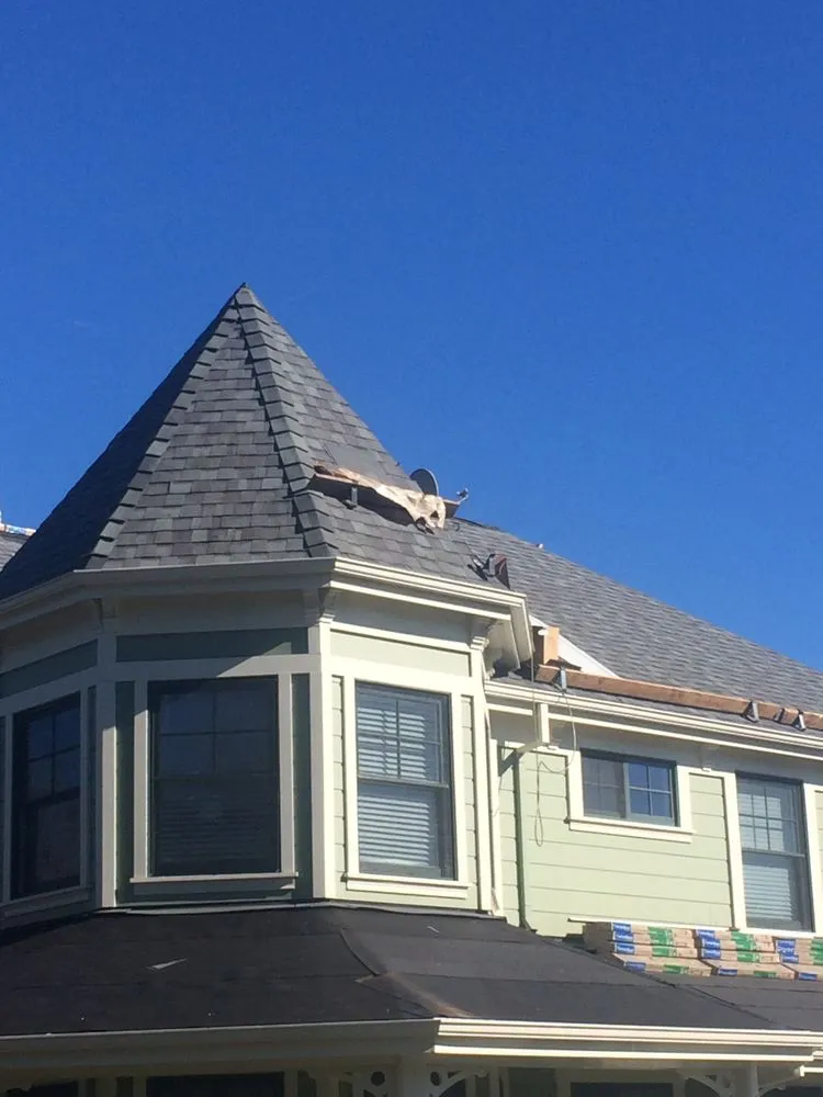 Slide of Caliber Roofing