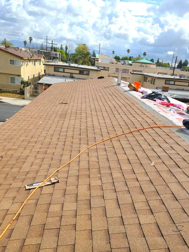 Professional roof replacement after storm damage across Reseda, CA - California Green Roofing