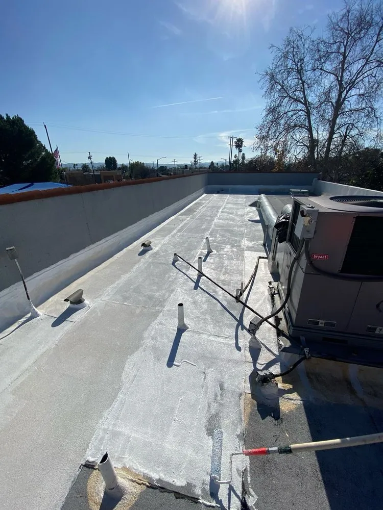 Trusted flat roof repair after storm damage in Reseda, CA by California Green Roofing