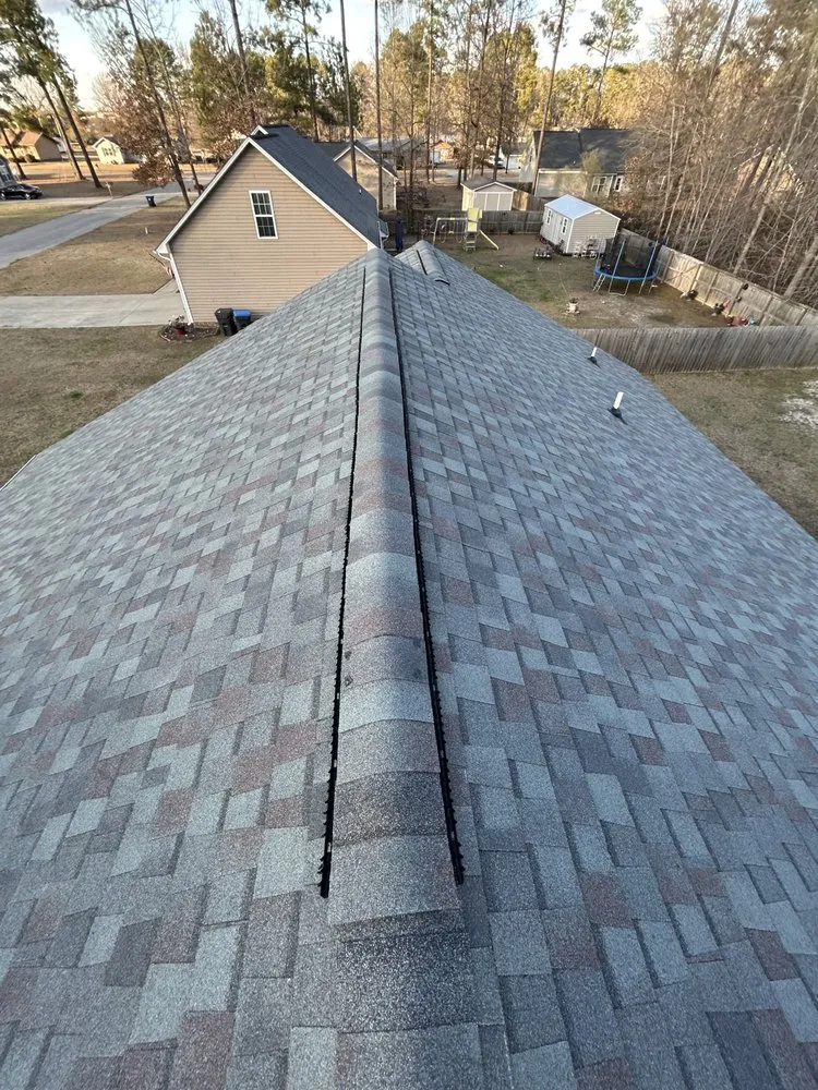 Slide of Calvary Roofing