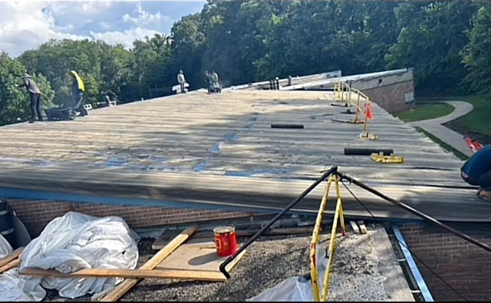 Slide of Calvary Roofing