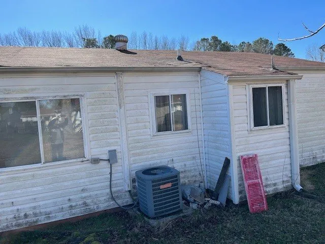 Slide of Calvin's Roofing Repair