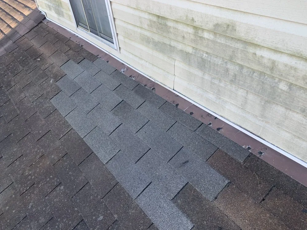 Slide of Calvin's Roofing Repair