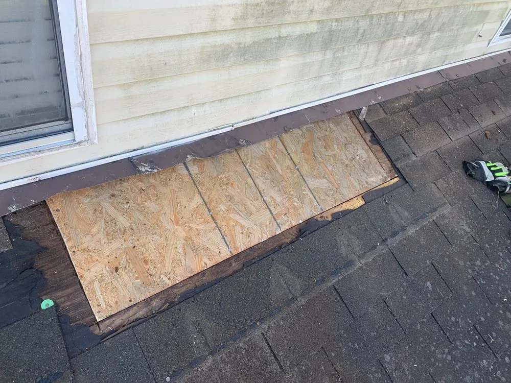 Slide of Calvin's Roofing Repair