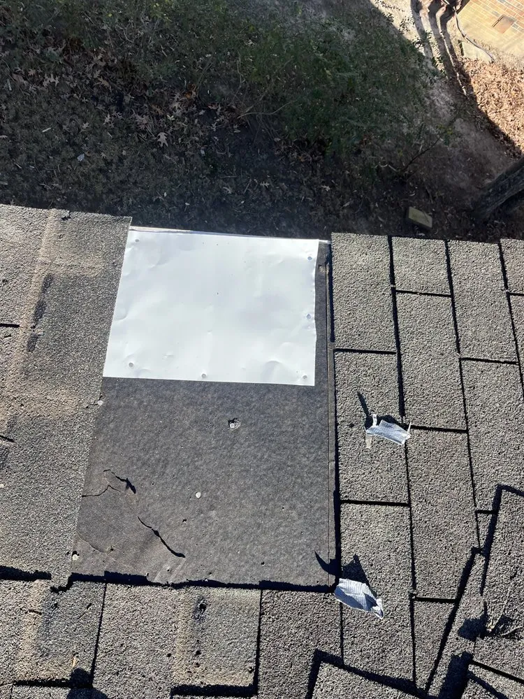 Slide of Calvin's Roofing Repair
