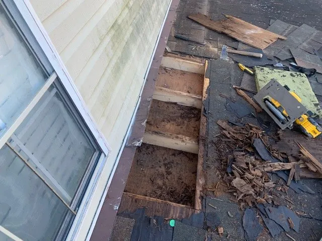 Slide of Calvin's Roofing Repair