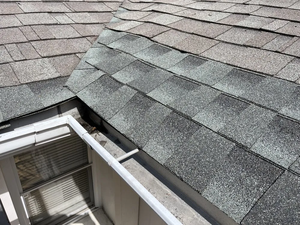 Slide of Calvin's Roofing Repair