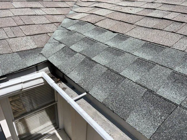 Slide of Calvin's Roofing Repair