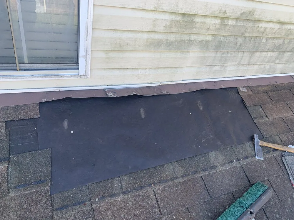 Slide of Calvin's Roofing Repair