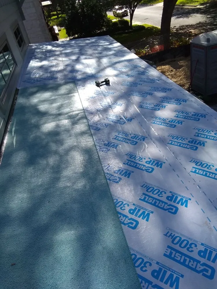 Slide of Camacho Roofing Construction