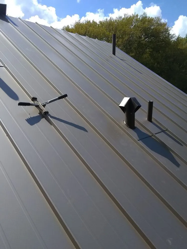 Slide of Camacho Roofing Construction