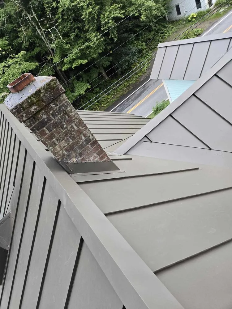 Slide of Camarro Roofing And Construction